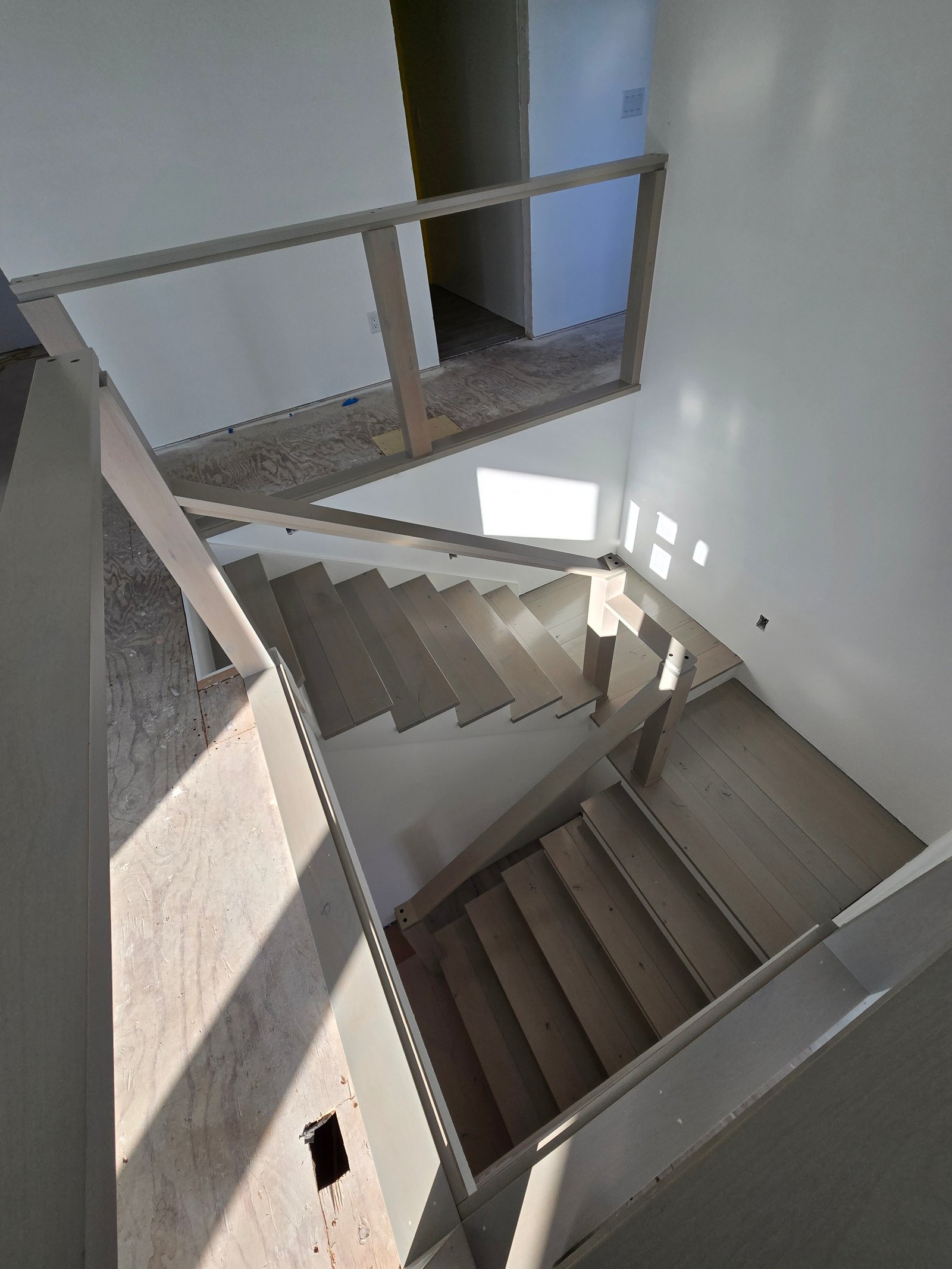 Completed alder staircase and built-in bench Tillamook Oregon