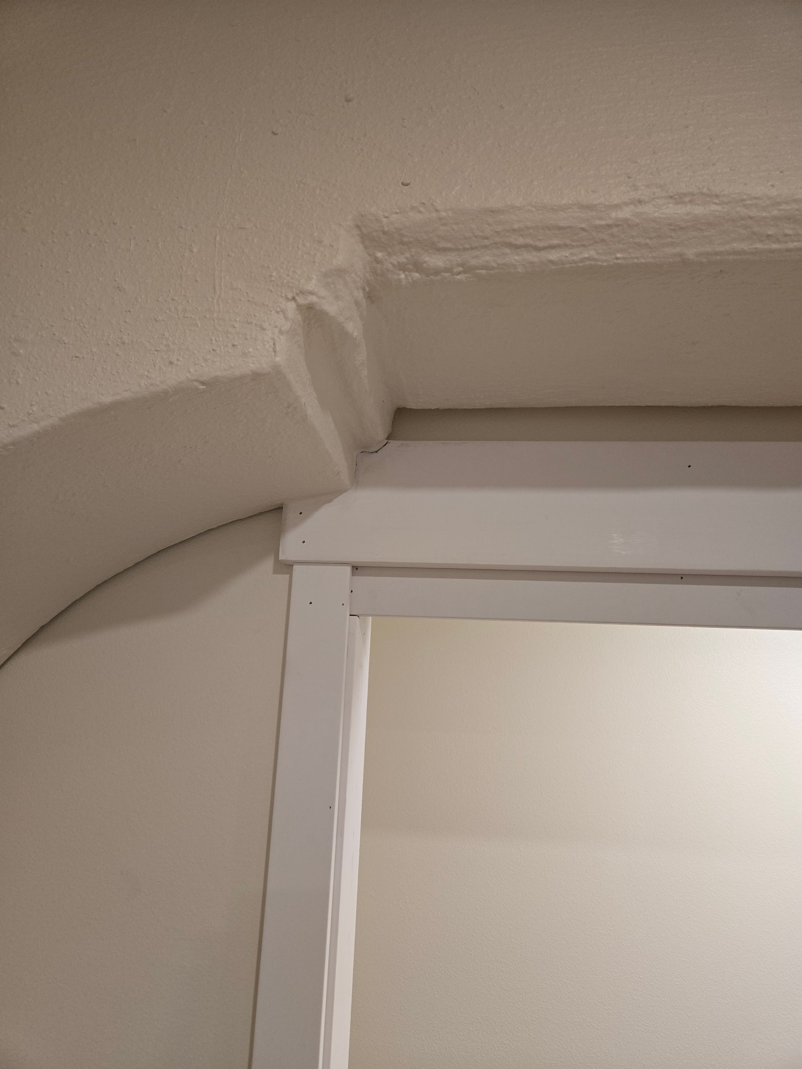 Finished trim around concrete pillar