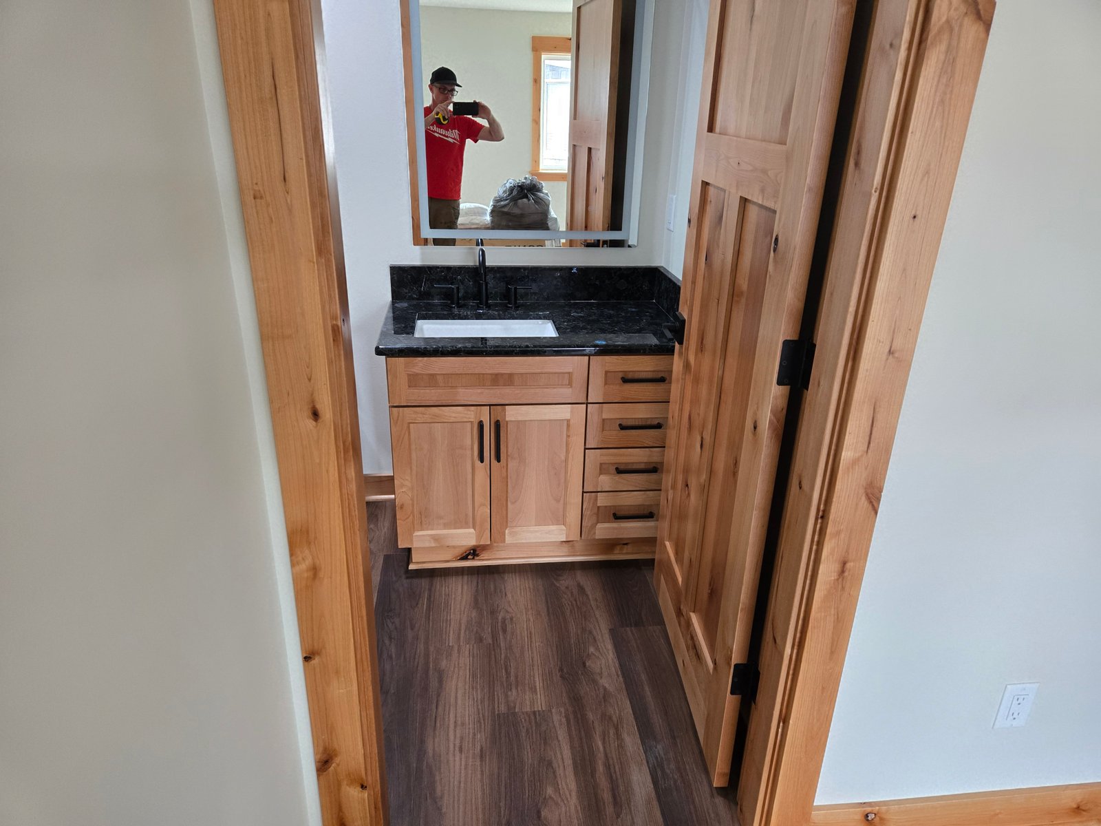 Custom alder bathroom vanity with tile work